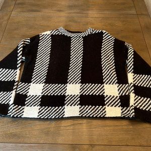 Never worn black and white checkered sweater